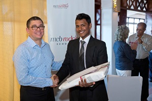 Scholars receiving their gifts with MCB in 2014